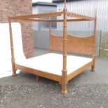 And So To Bed four poster canopy bed, with carved posts and finials.