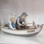 A Lladro figure group 'Fishing with Gramps'.