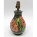 Walter Moorcroft, Hibiscus on green lamp base, bal