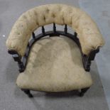 A Victorian upholstered captains armchair