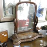 A Victorian mahogany arch form toilet mirror on sc