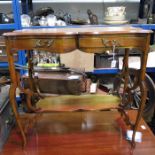 An Edwardian mahogany side table