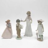 Three Nao Lladro figures of children and a similar