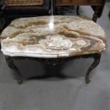 A marble topped gilt metal occasional table