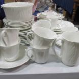 A Shelley white glazed part tea service, moulded p