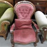 A Victorian mahogany framed crown back armchair
