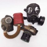 A WWII no 4 mk 3 gas mask respirator with canister and haversack, together with an Avon 1989 gas mas