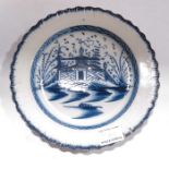 A pearlware blue and white plate, 24cm wide, together with a 19th century peonies pattern blue and w