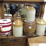 A Collection of stoneware flagons and barrel syph