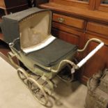 A Silver Cross dolls pram