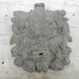 A cast lead fountain head, modelled as green man,