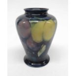 A Moorcroft pottery wisteria on blue vase, baluste