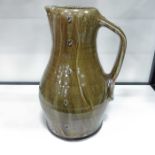 A Studio pottery jug, baluster form, brown streake