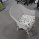 A Lloyd Loom armchair