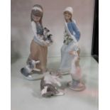 A Lladro figure 'Following her Cats', seated girl