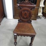 A George III mahogany hall chair