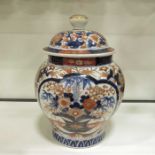 A Chinese Imari vase and cover, ogee form panels d