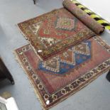 A Caucasian style rug and a woolwork example (2)