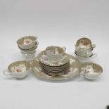 A set of nine English porcelain tea cups, painted