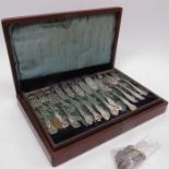 A set of twelve plated fish eaters, with chased d