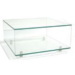 A contemporary Glassdomain glass coffee table, open cuboid form with low shelf, on four adjustable b