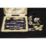 A George V silver manicure set, including a silver