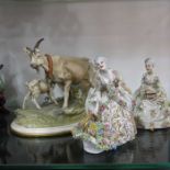 Three Continental porcelain figurines, flower sell