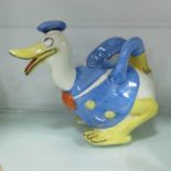 A Wade Heath pottery Donald Duck teapot, black pri