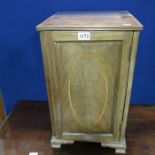 An Edwardian satinwood bedside cabinet