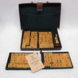 A Mah-Jongg set by Jackpot, in fitted leather case