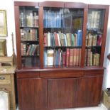 A large rosewood effect three bay cabinet bookcase