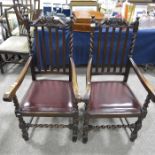A pair of 17th century style oak armchairs, slatted backs and barley twist supports