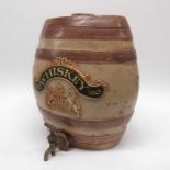 A stoneware whiskey keg, relief moulded polychrom