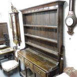 18th Century oak dresser, close boarded shelved ra