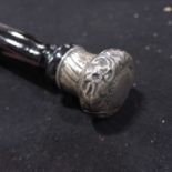 A silver mounted ebonised walking cane