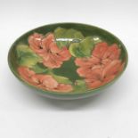 Walter Moorcroft, hibiscus on green bowl, label an