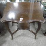 An Edwardian serpentine topped occasional table, o