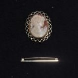 A 9ct gold shell cameo brooch and a 9ct gold bar b