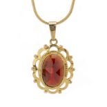 A set of 14ct gold garnet jewellery