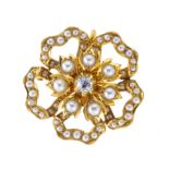 An Edwardian 15ct gold old-cut diamond and split pearl floral pendant