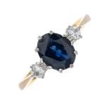 An 18ct gold sapphire and diamond three-stone ring