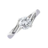 A platinum brilliant-cut diamond single-stone ring