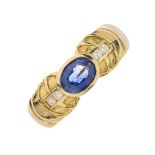 An 18ct gold sapphire and diamond dress ring