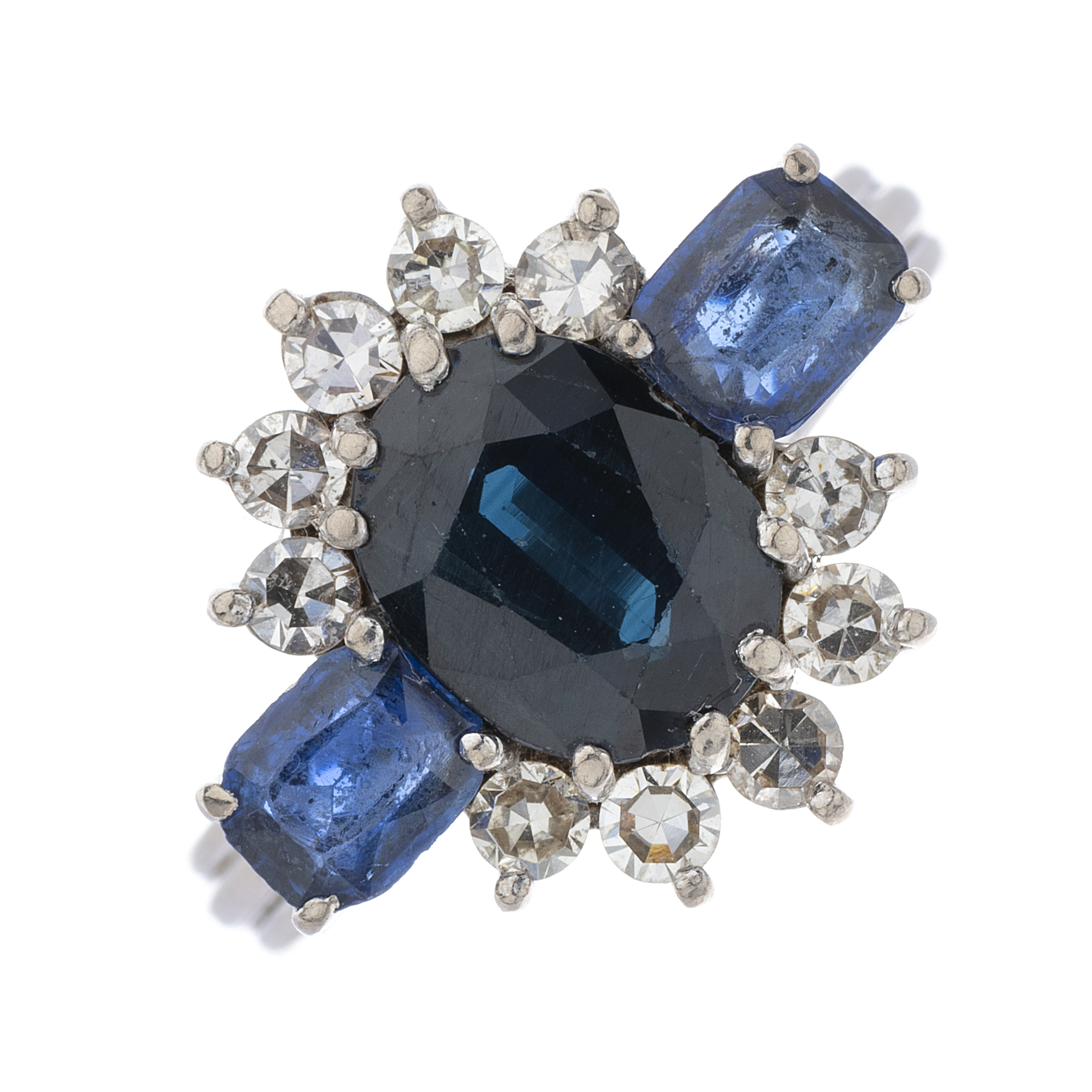 Graff, a mid 20th century sapphire three-stone and diamond dress ring