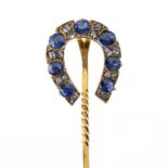 A late 19th century 18ct gold sapphire and rose-cut diamond horseshoe stickpin