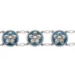 William Hair Haseler for Liberty & Co., an Arts & Crafts silver enamel floral bracelet