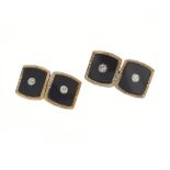 A pair of Art Deco 18ct gold and platinum, diamond and onyx cufflinks