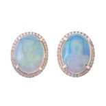 A pair of 18ct gold opal and diamond cluster earrings