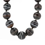 A late Victorian banded agate bead necklace, with gold clasp