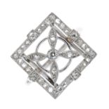 An Edwardian platinum diamond floral openwork dress ring